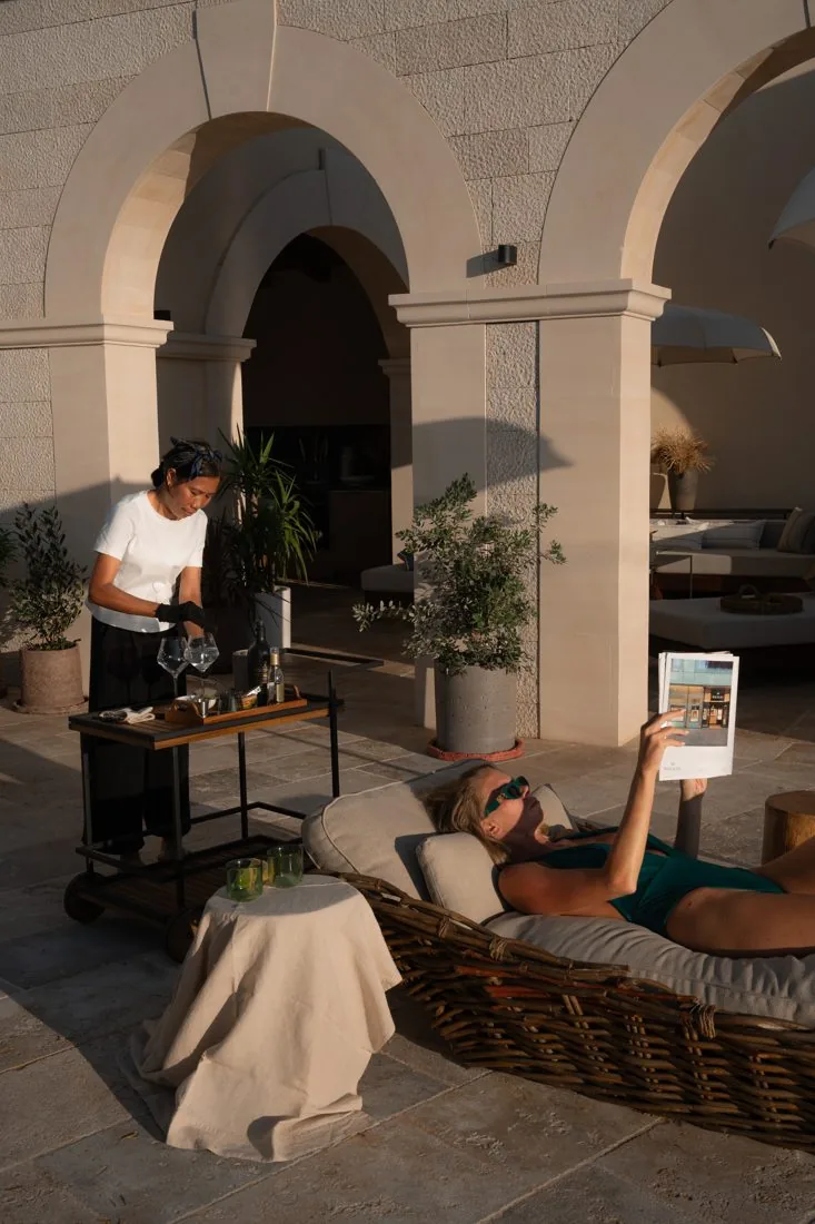 Service under the stone arches at LaMaison