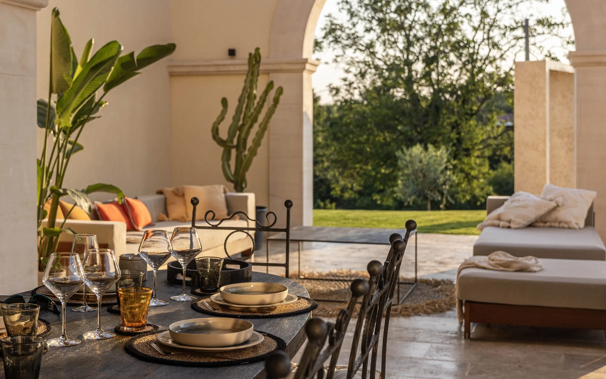 A long table laid with a view of the garden at LaMaison