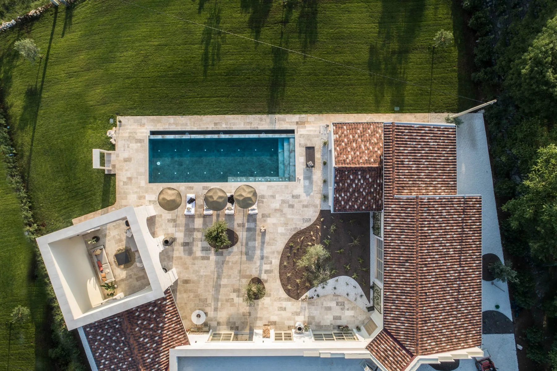 The salty pool and the grounds seen from above at LaMaison